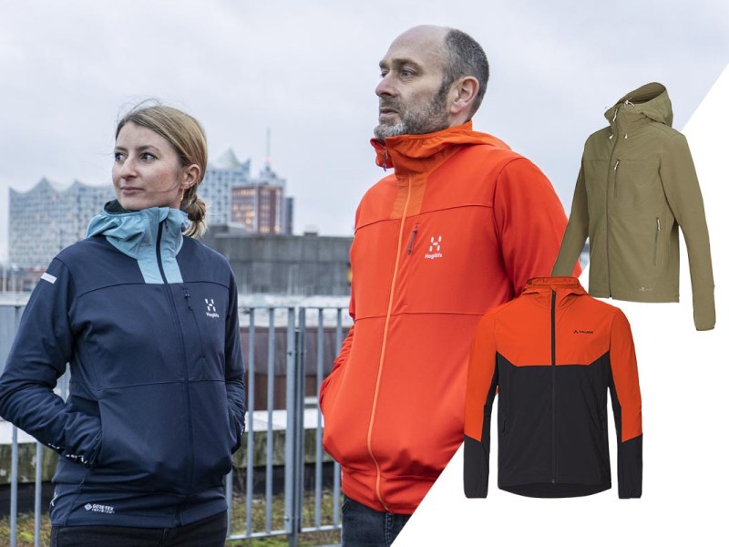 Personen mit einer Softshelljacke unter freiem Himmel.